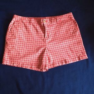 Red and white printed patterned shorts